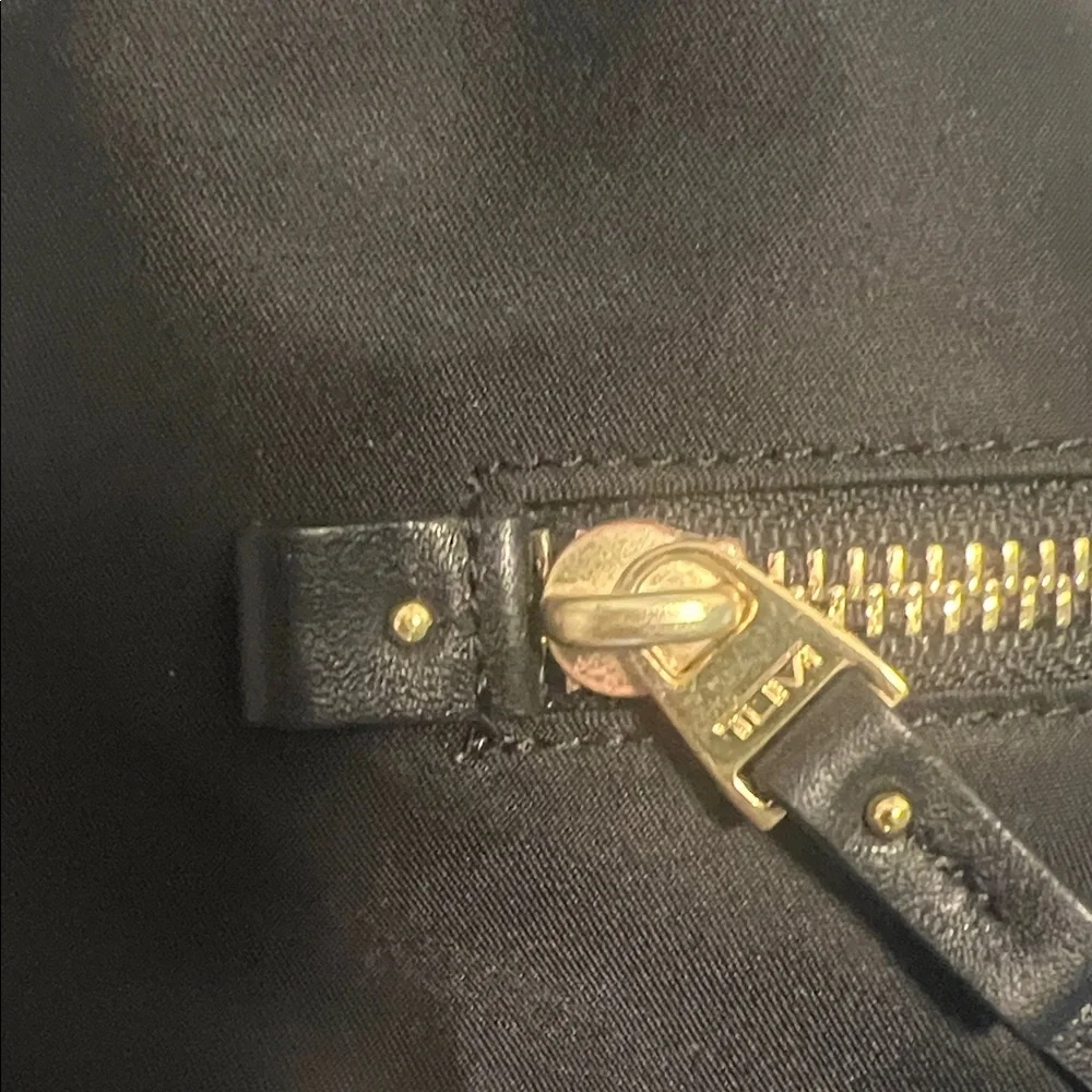 Tumi Halle Black Backpack with Gold Accents